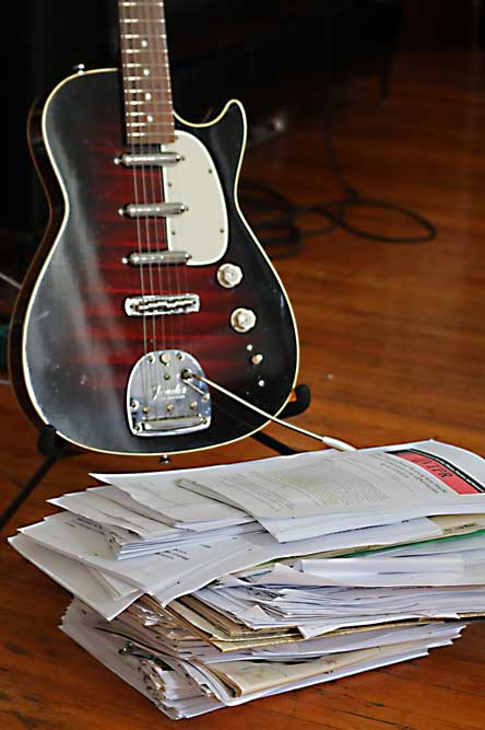 Photo of guitar and documents