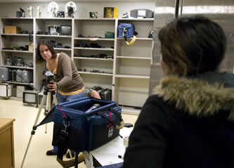Alicia Garcia, left, assists Elana Schwartz with video equipment from the Media Arts equipment cage. Secretary of State Mary Herrera is sponsoring a contest asking students to make a public service announcement encouraging people with disabilities to vote. (Javier Zamora / Daily Lobo) Alicia Garcia, left, assists Elana Schwartz with video equipment from the Media Arts equipment cage. Secretary of State Mary Herrera is sponsoring a contest asking students to make a public service announcement encouraging people with disabilities to vote. (Javier Zamora / Daily Lobo)