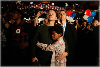 prop-8-gay-family At a "No on 8" party at the Music Box Henry Fonda in Hollywood, Jeff Miller, left, and Todd Thurman, who are married, listen to Barack Obama's speech with their son, Justin. Photo by .Barbara Davidson / Los Angeles Times.