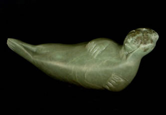 sedna-carving Artist's conception of the Inuit goddess Sedna, who rules over the seas (from the collection of M.E Brown).