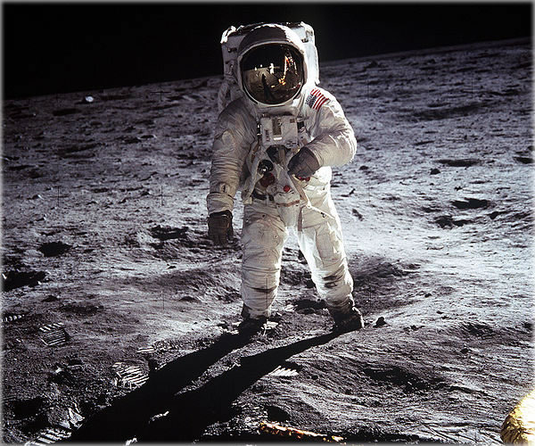 blog-july20 Astronaut Buzz Aldrin, lunar module pilot, walks on the surface of the Moon near the leg of the Lunar Module (LM) "Eagle" during the Apollo 11 extravehicular activity (EVA). Astronaut Neil A. Armstrong, commander, took this photograph with a 70mm lunar surface camera. While astronauts Armstrong and Aldrin descended in the Lunar Module (LM) "Eagle" to explore the Sea of Tranquility region of the Moon, astronaut Michael Collins, command module pilot, remained with the Command and Service Modules (CSM) "Columbia" in lunar orbit.