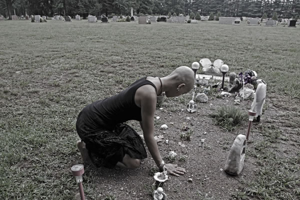 600_simone_kaila_edit_0652+web Simone at the grave of her friend and lover Kaila Ann Watson, who died of a heroin overdose in the spring. Photo by Eric Francis for Book of Blue.