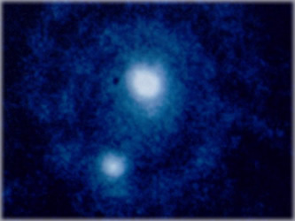 Image of Pluto and Charon taken by Hubble Space Telescope. Image of Pluto and Charon taken by Hubble Space Telescope.