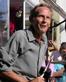 Levon Helm performing in 2004 on the Village Green in Woodstock, New York. Photo by Jaime Martorano.