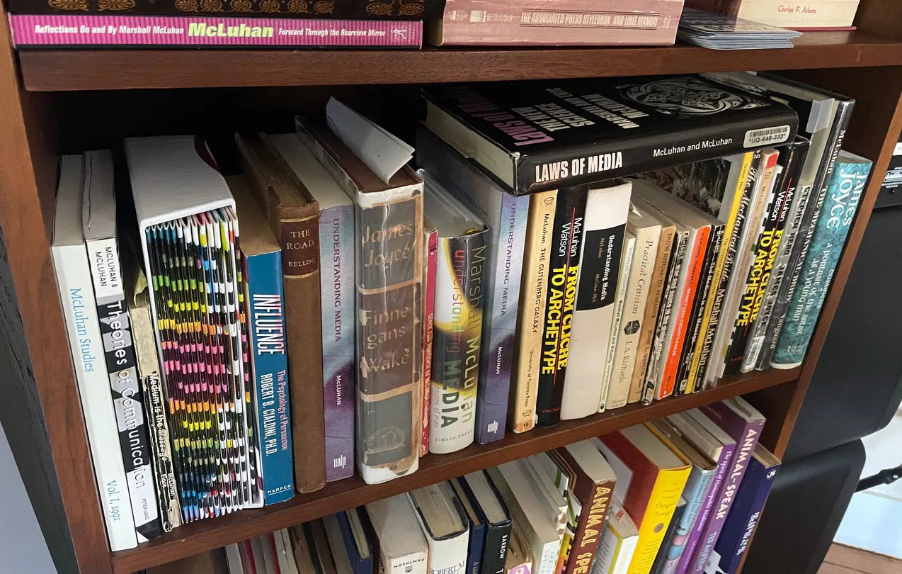 Bookshelf holding media studies book collection belonging to Eric Francis.